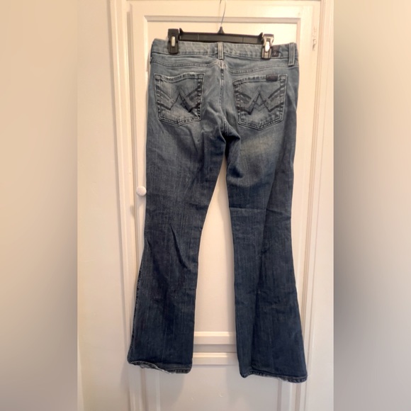 7 for all Mankind low rise and flare leg jean. - Picture 2 of 4
